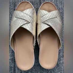 Gold slip on Vionic sandals.  Size 8